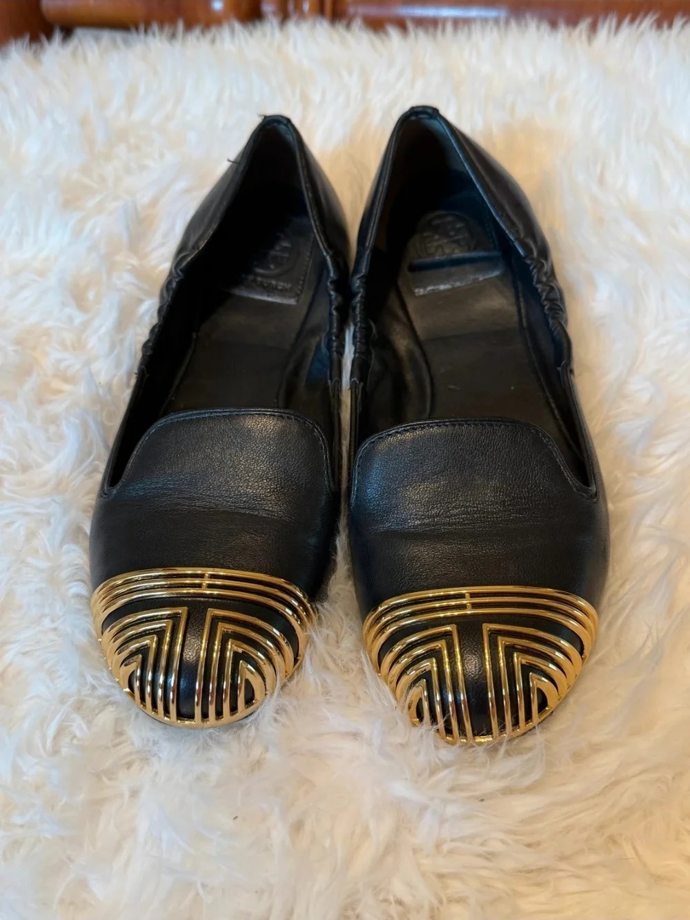 Tory Burch Black Leather Flats with Gold Decorative Cap Toe